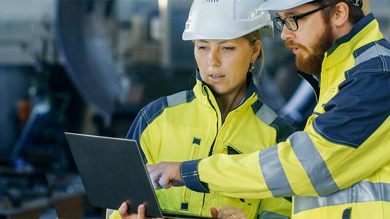 Man and woman in factory environment