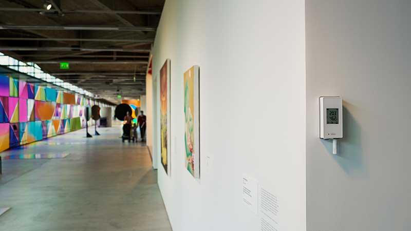 Jade logger with HMP115 on art museum wall