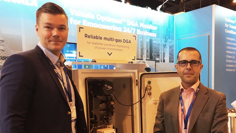 CIRED 2019 Vaisala stand with Teemu Auronen and Alava representative 