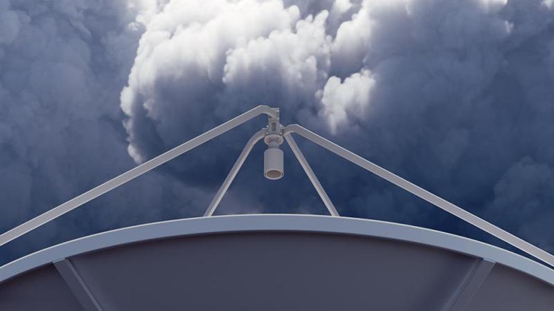 X-band radar antenna below a storm cloud
