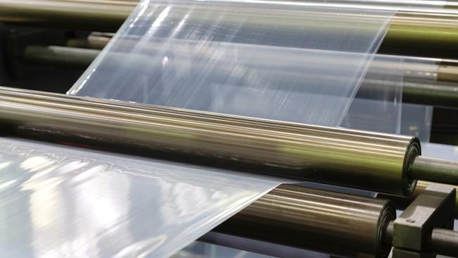 A roll of plastic packaging film 